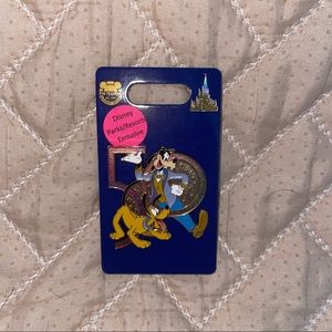 Official Disney 50th anniversary Pluto and Goofy trading pin.